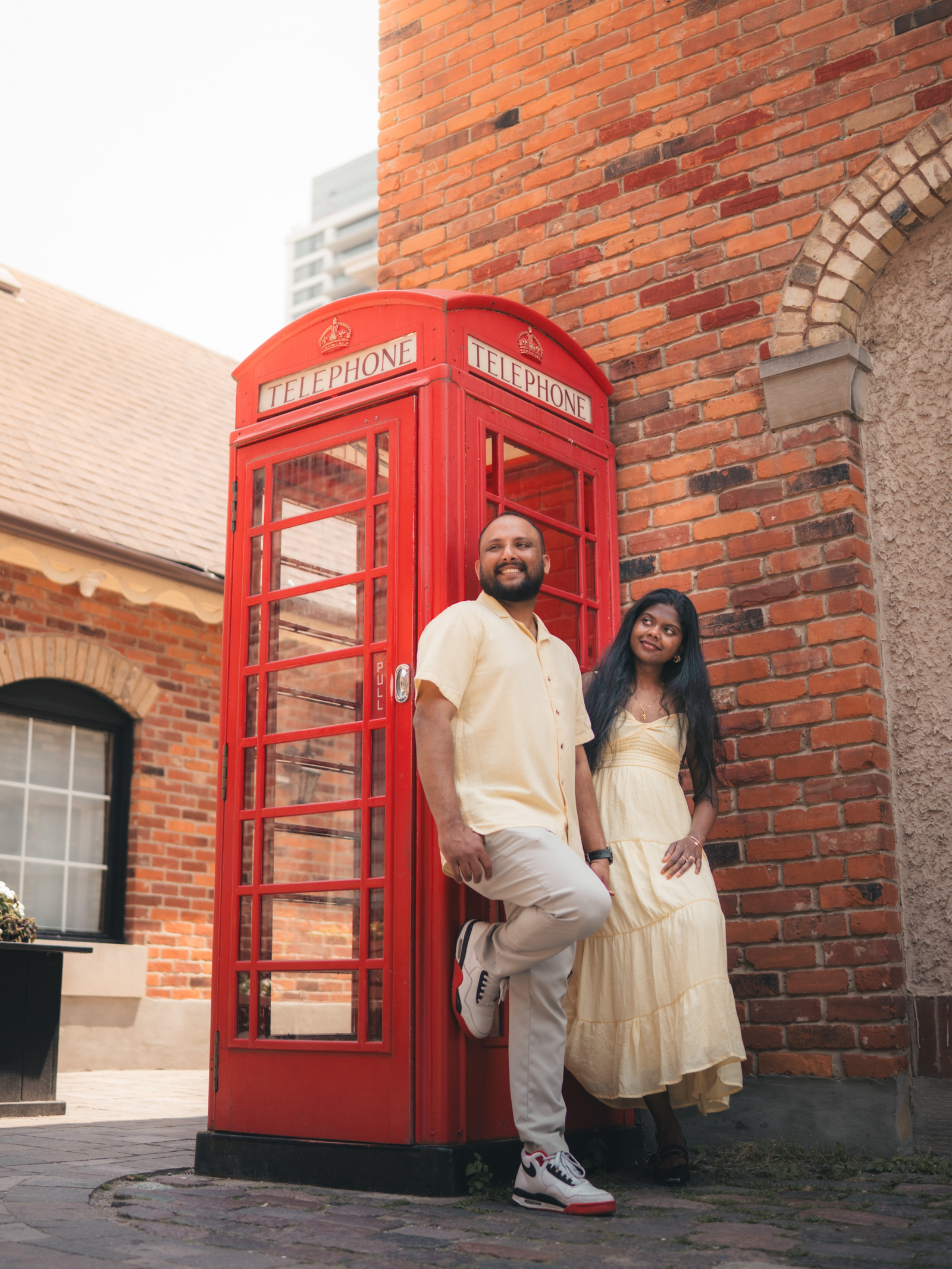 Abin and Jerlin at the phone booth
